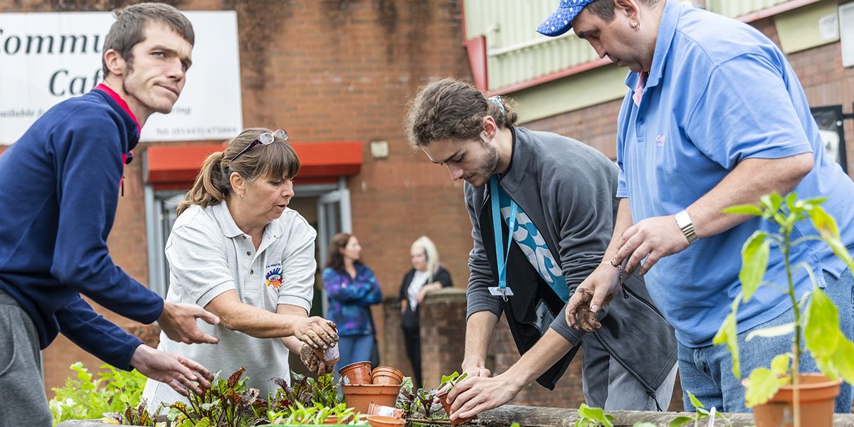 People planting plant pots in the community - Level 3 - Community Safety Advisor Apprenticeship