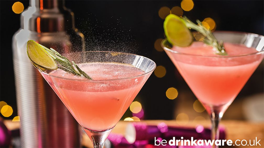 Two pink cocktails in martini glasses